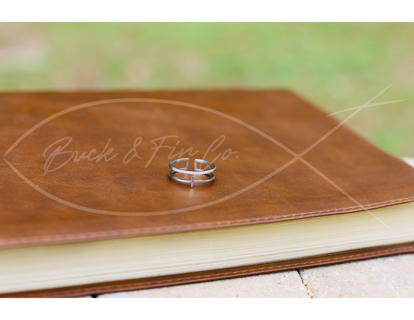 Cross/bar ring